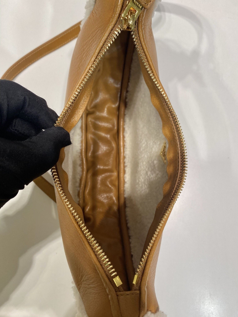 Pra*a hobo bags